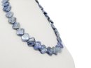 Blue, drilled kyanite plates