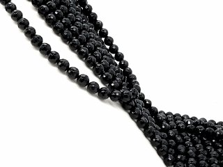 Faceted, pierced onyx beads