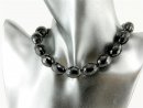 Onyx strand - faceted olive-shape, 20x15 mm /1724