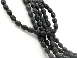 Durchbohrte, schwarze Lava-Kissen für Schmuck