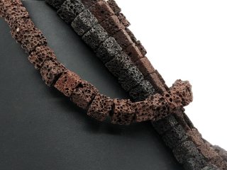 Pierced cubes made of brown lava