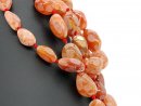 5488/ Carnelian strand - olive-shaped, matted and partly faceted - 41 cm