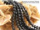 5705/ Onyx strand - partly faceted, 12 mm - 38,5 cm