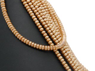 7381/ Culture Pearls strand - button-shaped, gold-brown 5x7 mm