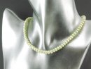7496/ Cultured Pearls strand - button-shaped, green 4x6...