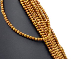 Cordon de perle de culture - baroque 5x6 mm rouge-dor&eacute;, longueur 37,5 cm /7572