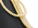 7602/ Cultured pearls strand - buttons-shaped, yellow, 8x11 mm - 39 cm