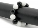 8681/ Bracelet - onyx howlite, faceted, 16 mm
