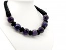 Necklace made from black yarn with large amethyst beads