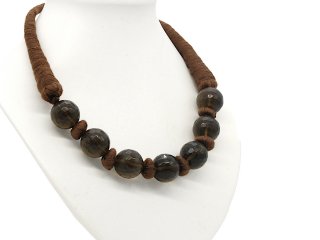 Thick necklace made from brown yarn with smoky quartz