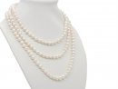 Long, individually knotted pearl necklace in white