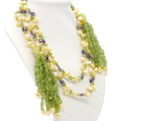 Open, long necklace made of yellow Biwa pearls, purple amethysts and green peridots