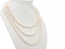 Long, white necklace with cultured pearls