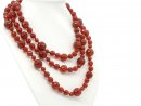Long necklace made from faceted red carnelian beads