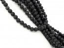 Black, pierced lava beads