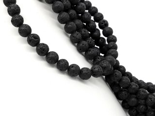 Pierced black lava balls