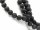 Perforated black lava stones for jewellery
