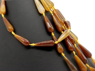 Orange-brown, faceted agate drops