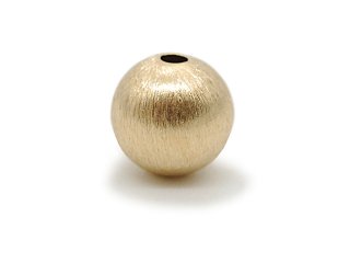 Elément en or avec trou pour enfiler des bijoux