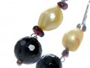 8575/ ear pendant - onyx, pearls and garnet