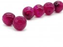 Two magenta agate beads