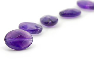 Oval faceted amethyst slice
