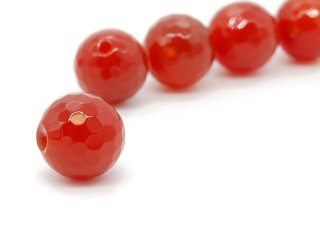 Faceted red carnelian ball