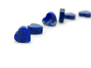 Heart-shaped pierced lapis lazuli disc
