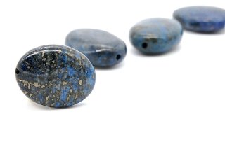 Oval pierced lapis lazuli disc