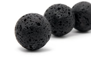 A large, black lava ball