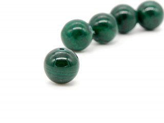 Pierced green malachite ball
