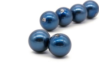 Two half drilled blue shell pearls