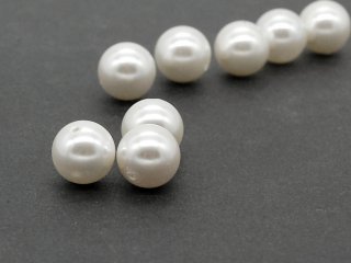 Three white shell pearls
