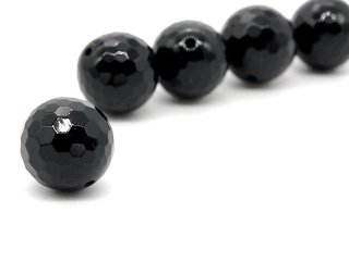 A pierced, faceted onyx sphere