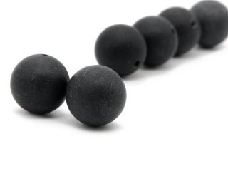 Two matted, pierced onyx balls