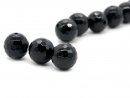 Three faceted pierced onyx beads