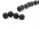 Four matted, pierced onyx beads