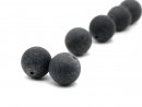 Two matted, pierced onyx balls