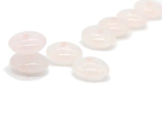 Four pierced rose quartz lenses