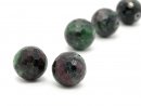 Two faceted gemstone beads