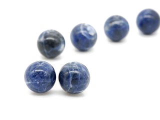 Two pierced blue sodalite balls