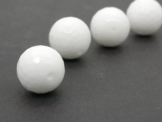 A large, faceted howlite bead