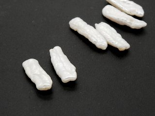 Two white biwa beads