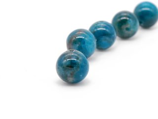 Pierced blue apatite ball