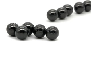 five black pierced shell pearls