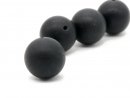 A pierced, large onyx ball in matt black