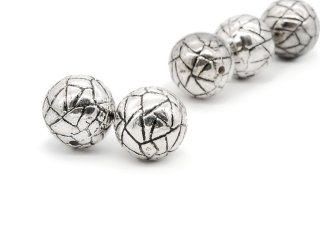 Two silver coloured beads