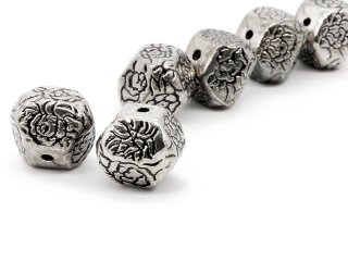 Two silver-coloured intermediate beads