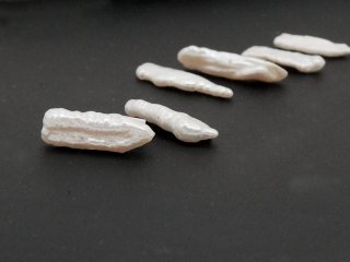 Two white Biwa beads