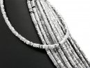 Pierced discs made of hematite in grey